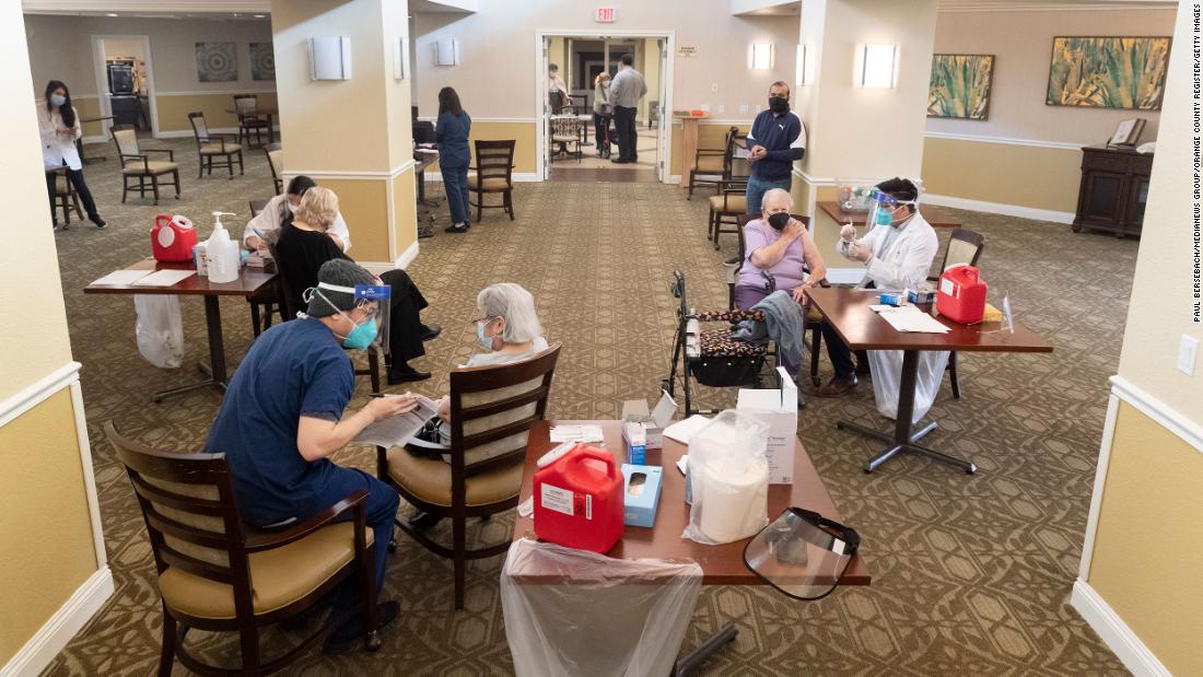 People receive a Covid-19 vaccine at the Emerald Court senior-living community in Anaheim, California, on January 8.