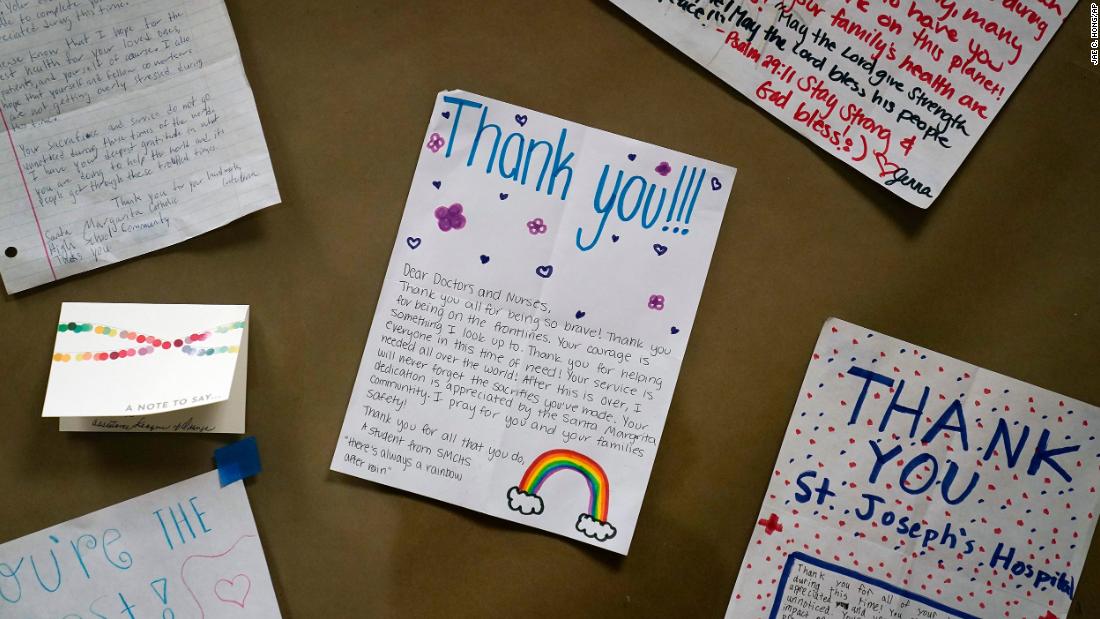 Thank-you letters are posted on a wall at the St. Joseph Hospital in Orange, California, on January 7.
