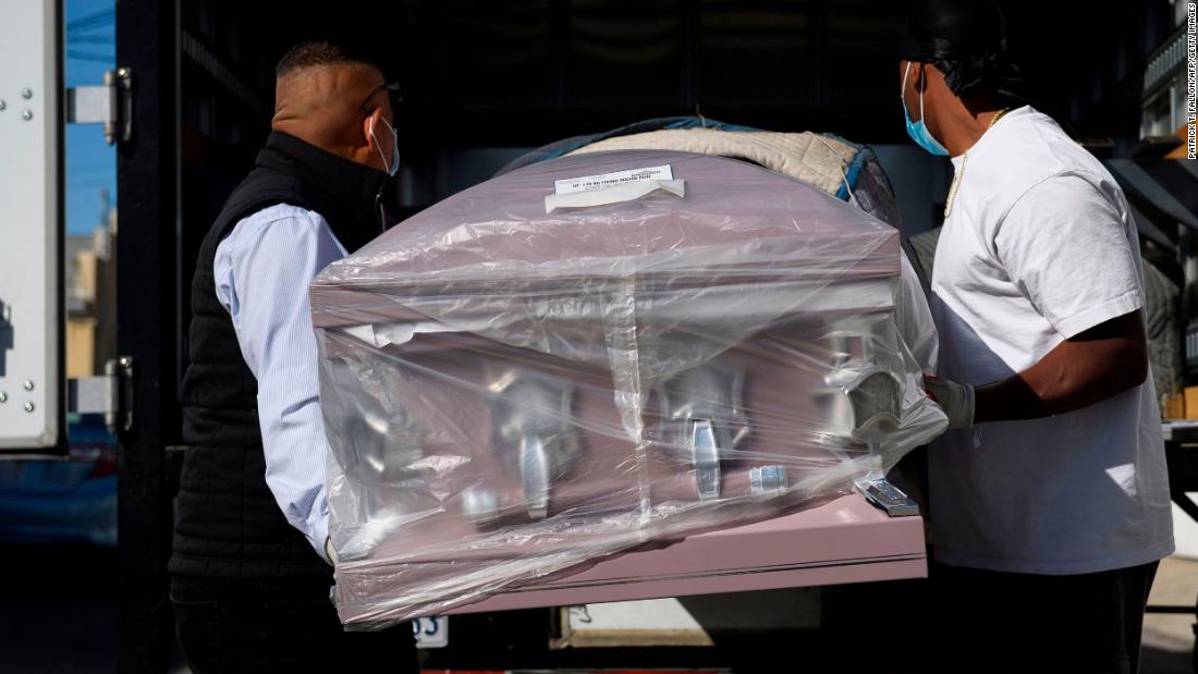 An empty casket is delivered to the Continental Funeral Home in Los Angeles on December 31.