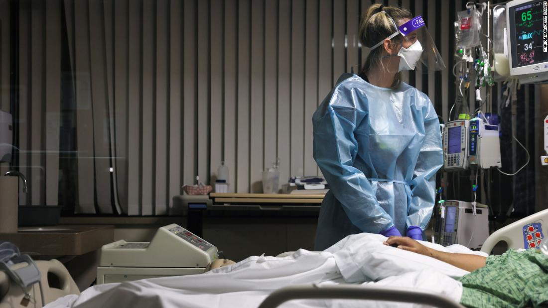 Registered nurse Tricia Cook cares for a Covid-19 patient January 5 at the Providence St. Mary Medical Center in Apple Valley, California.