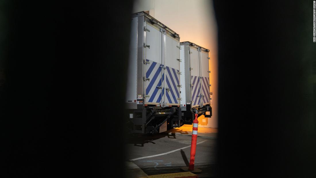 Refrigerated morgue trailers sit outside the office of the Los Angeles County coroner on January 6.