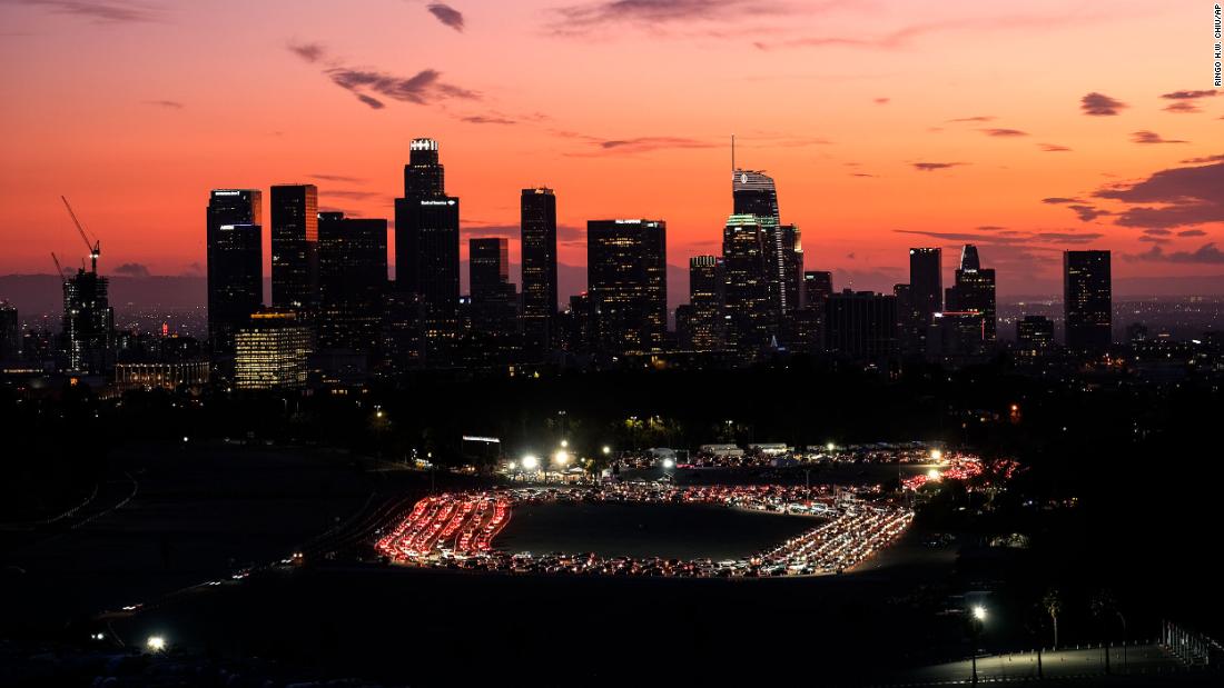 Motorists line up for Covid-19 testing at Los Angeles&#39; Dodger Stadium on January 4.