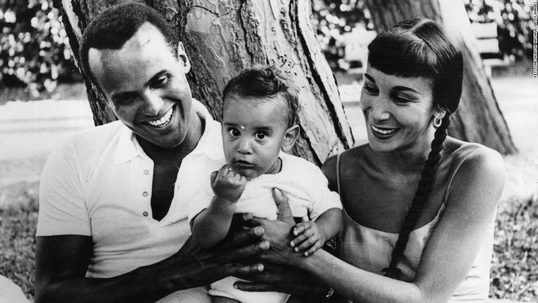 Belafonte enjoys a short holiday with his wife, Julie, and their 9-month-old son, David, near Genoa, Italy, in 1958.