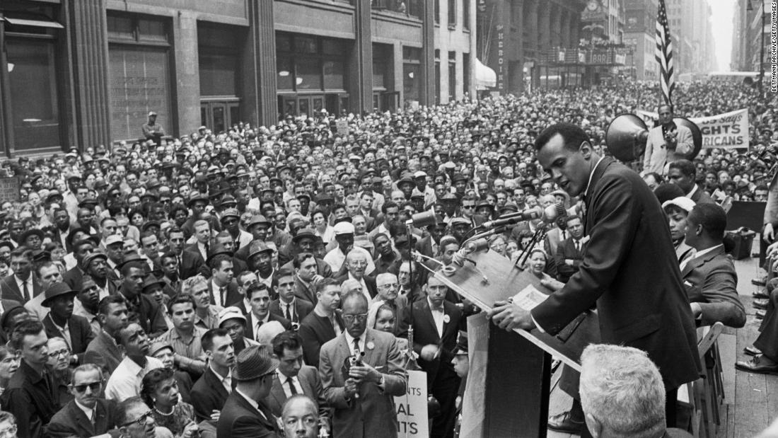 A crowd gathers in New York as Belafonte sings at a civil rights rally in 1960.