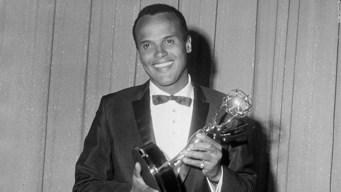 Belafonte poses with the Emmy Award he won in 1960 for the musical special &quot;Tonight With Belafonte.&quot; He was the first African American to win an Emmy.