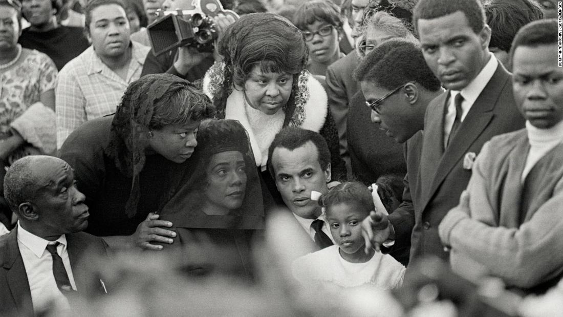 Belafonte sits next to Coretta Scott King, Martin Luther King Jr.&#39;s widow, at her husband&#39;s funeral in 1968.