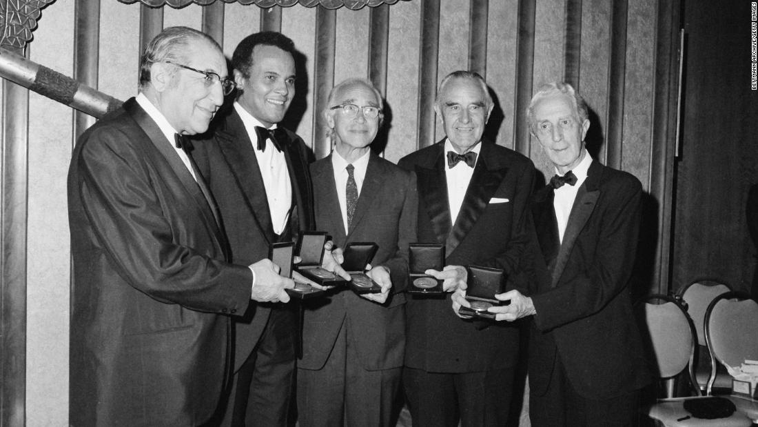 Belafonte and other recipients of Albert Einstein Commemorative Awards display their medallions after being honored in 1972. From left are Max M. Fisher, Belafonte, Dr. George Wald, W. Averell Harriman and Norman Rockwell.