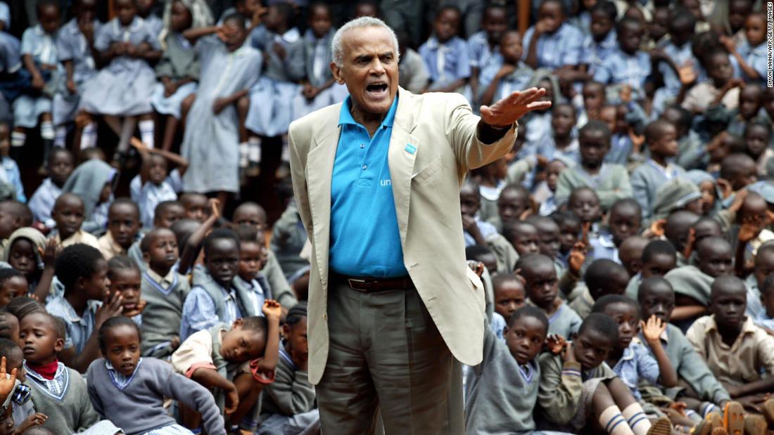 Belafonte addresses schoolchildren on the outskirts of Nairobi, Kenya, in 2004. Belafonte was urging nations to fund their own free education programs instead of relying on unfulfilled promises from richer nations.