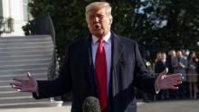 U.S. President Donald Trump speaks to the press as he departs the White House on travel to visit the U.S.-Mexico border Wall in Texas, in Washington, U.S., January 12, 2021. REUTERS/Kevin Lamarque