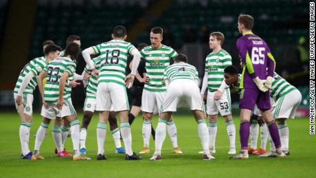 Celtic players huddle ahead of their match against Hibernian.