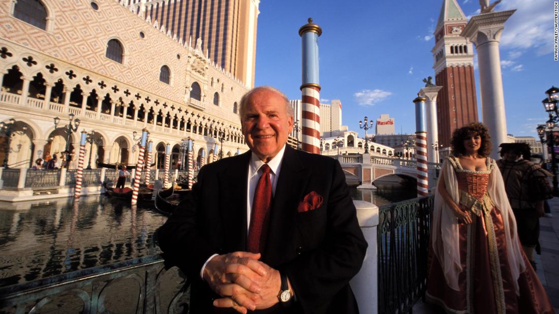 Adelson poses in front of The Venetian in Las Vegas. His big break came in the late 1970s, when he launched a computer trade show known as Comdex. He sold it in 1995 for nearly $900 million, parlaying that convention business into a casino empire that comprises properties in Las Vegas and Asia.