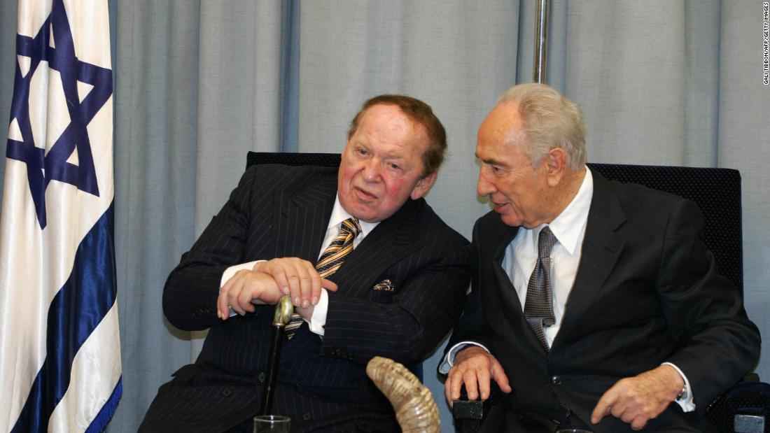 Adelson listens to Israeli President Shimon Peres during an official event at the president&#39;s residence in Jerusalem in 2007. Adelson owned Israel&#39;s largest daily newspaper by circulation. He also donated to the Holocaust remembrance center in Jerusalem and helped underwrite Birthright Israel, which pays for educational trips to Israel for young Jewish adults.