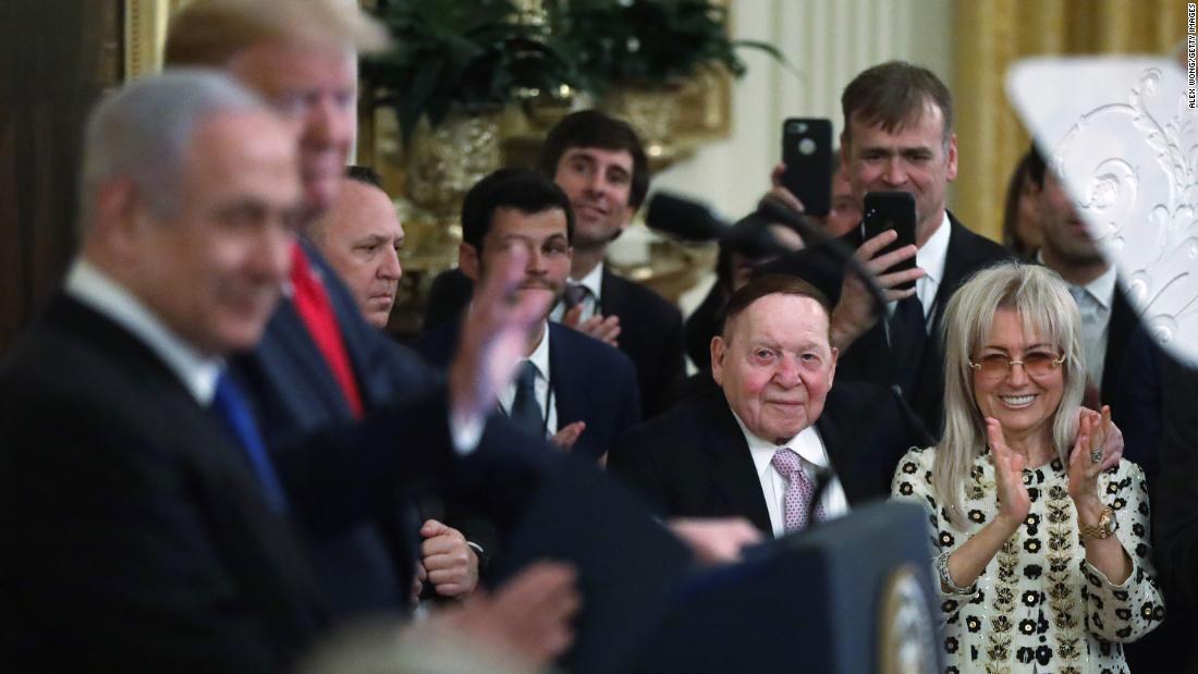 The Adelsons attend a White House event with Trump and Israeli Prime Minister Benjamin Netanyahu in 2020.