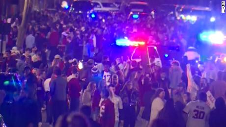 Video shows massive crowds after college football win