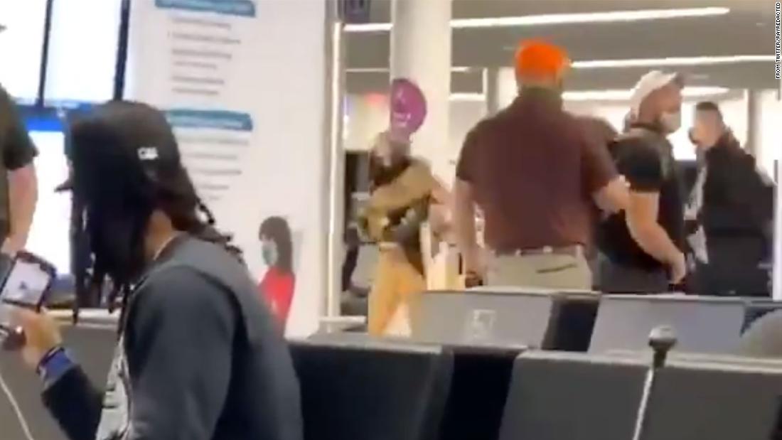 Fact check: video of man in airport tantrum was kicked out of the plane for rejecting the mask policy, not because of the Capitol insurrection