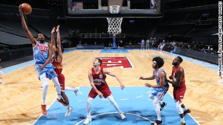 Durant shoots the ball during the game against the Denver Nuggets.