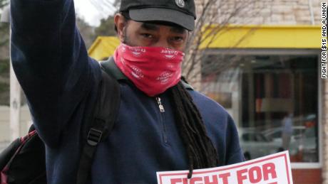 Umar Benson, a worker striking with Fight for $15 and a Union in Durham, NC on January 15, 2021.