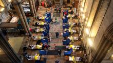 Covid-19 vaccines are given with organ music at UK's historic Salisbury Cathedral 