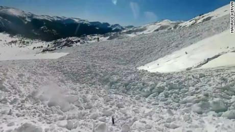 A snowboarder survived an avalanche and caught the heart-racing experience on video