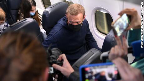 Russian opposition leader Alexei Navalny is seen in a Pobeda plane after it landed at Moscow&#39;s Sheremetyevo airport on January 17, 2021.