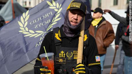 A member of the Proud Boys speaks to the media at a gun rights rally on Monday near the Capitol in Richmond, Virginia.