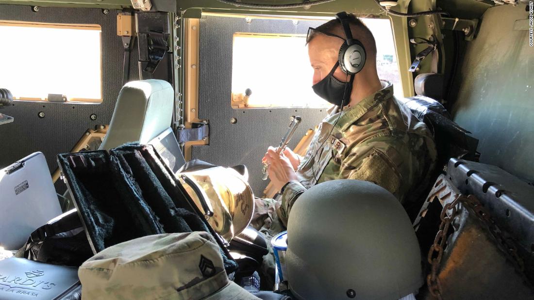 The National Guard teaches music on the back of a Humvee while protecting the U.S. Capitol