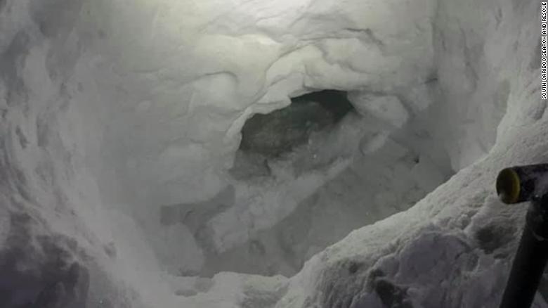 A missing teen snowmobiler built a snow cave to survive until rescuers arrived