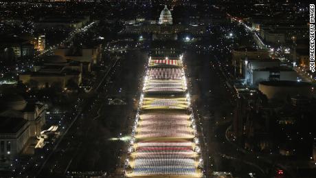 The &quot;Field of Flags&quot; is illuminated on the National Mall in preparation for the inauguration of President-elect Joe Biden. 