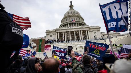 WASHINGTON, DC - JANUARY 06: Pro-Trump supporters storm the U.S. Capitol following a rally with President Donald Trump (Photo by Samuel Corum/Getty Images)