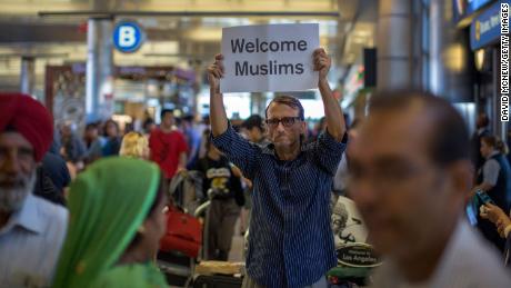 After multiple legal challenges, the third version of the travel ban was upheld barring travelers from several countries.