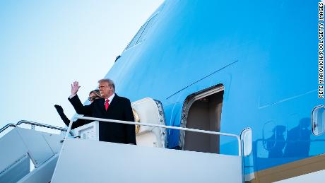 President Donald Trump and first lady Melania Trump wave to supporters as they board Air Force One to head to Florida on January 20, 2021 in Joint Base Andrews, Maryland. Trump, the first president in more than 150 years to refuse to attend his successor&#39;s inauguration, is expected to spend the final minutes of his presidency at his Mar-a-Lago estate in Florida. (Photo by Pete Marovich - Pool/Getty Images)