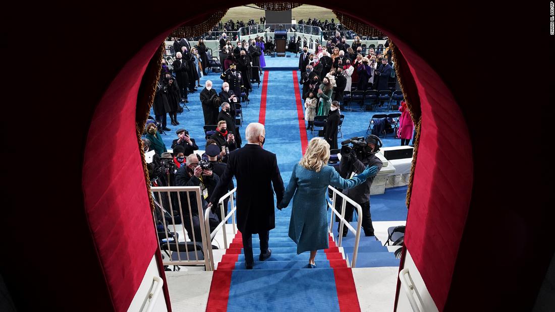 Biden and his wife, Jill, walk out for &lt;a href=&quot;https://www.cnn.com/2021/01/19/politics/gallery/joe-biden-inauguration-photos/index.html&quot; target=&quot;_blank&quot;&gt;his inauguration&lt;/a&gt; in January 2021.