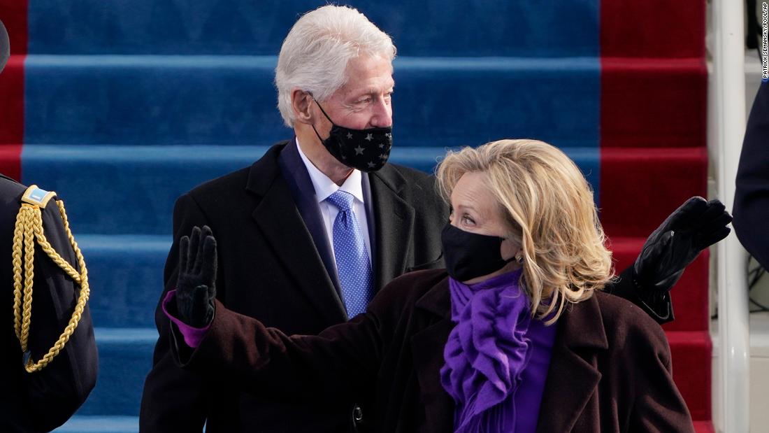 Former President Bill Clinton and former first lady Hillary Clinton arrive for the inauguration.
