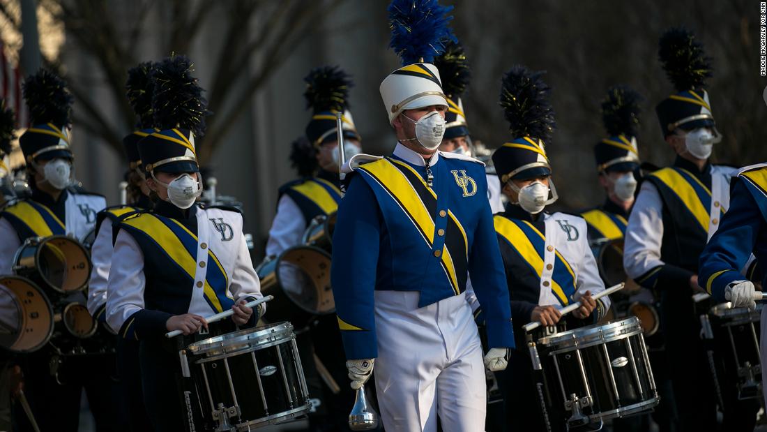 The drumline from the University of Delaware takes part in Biden&#39;s inaugural parade.