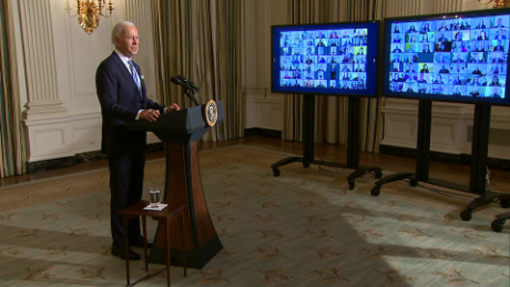 President Joe Biden addresses staff virtually on his first day in the White House. 