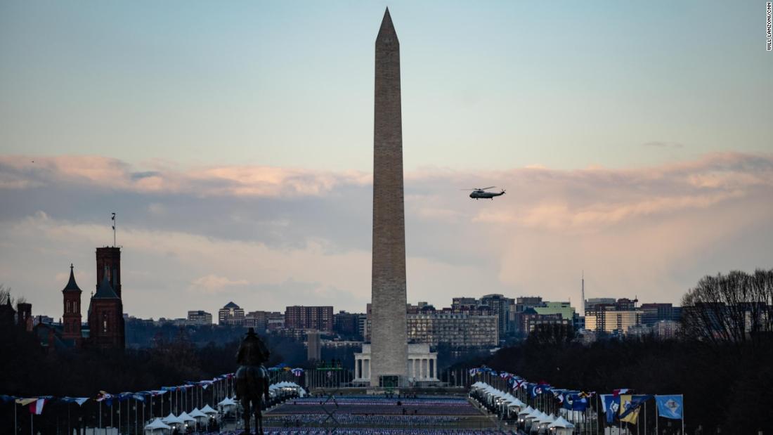 Marine One flies past the Washington Monument as Trump left the nation&#39;s capital.