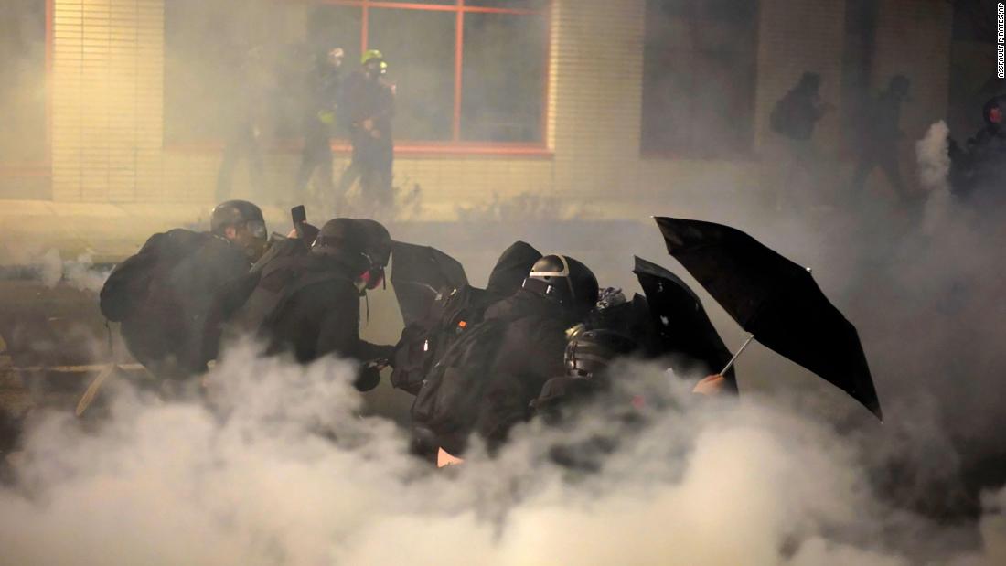 At least 8 arrested in Portland as demonstrators vandalize federal ICE building