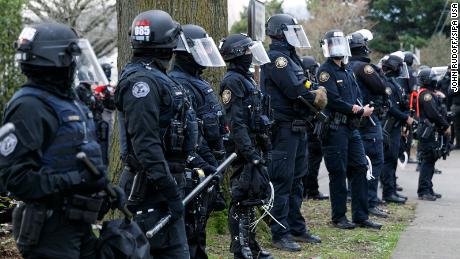Portland police disperse crowd with pepper spray after officer fatally ...
