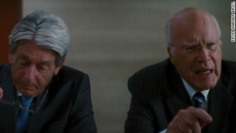 Leahy, scowling, berates someone off-screen in his role as a board member of Wayne Enterprises in "The Dark Knight Rises."