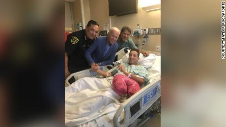Officer Taylor Roccaforte was recovering from gunshot wounds when then-candidate Joe Biden came to see him in the hospital. His father, Samuel Roccaforte (right), and Houston Police Chief Art Acevedo, were also at his bedside.