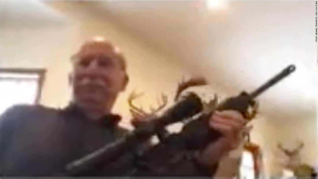 Michigan County Commissioner pulls out his gun during a virtual meeting when a resident asks the council to report Proud Boys