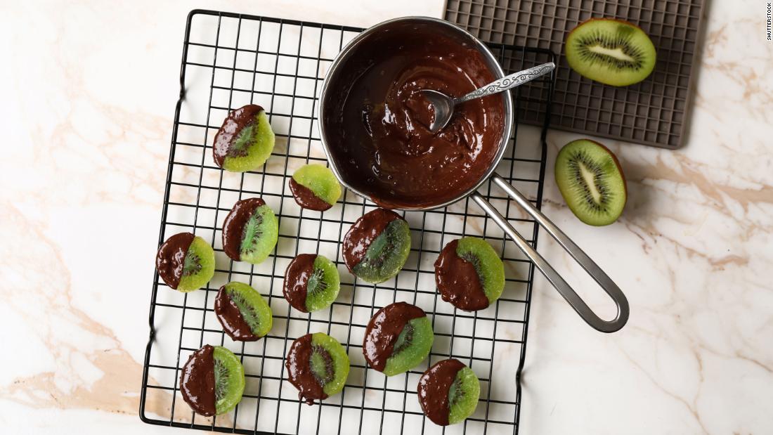 Enjoy a decadent dessert of dark chocolate-dipped kiwis, which will further improve your mood thanks to loads of vitamin C. 