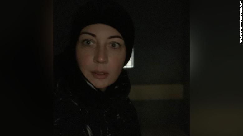 Navalny&#39;s wife said she was arrested, and posted a photo of herself in a police car on Instagram.