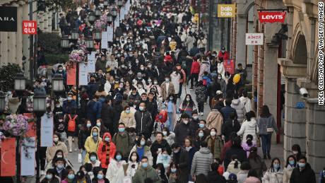 Crowds have returned to Wuhan's famous Jianghan shopping street, which was desserted this time last year.