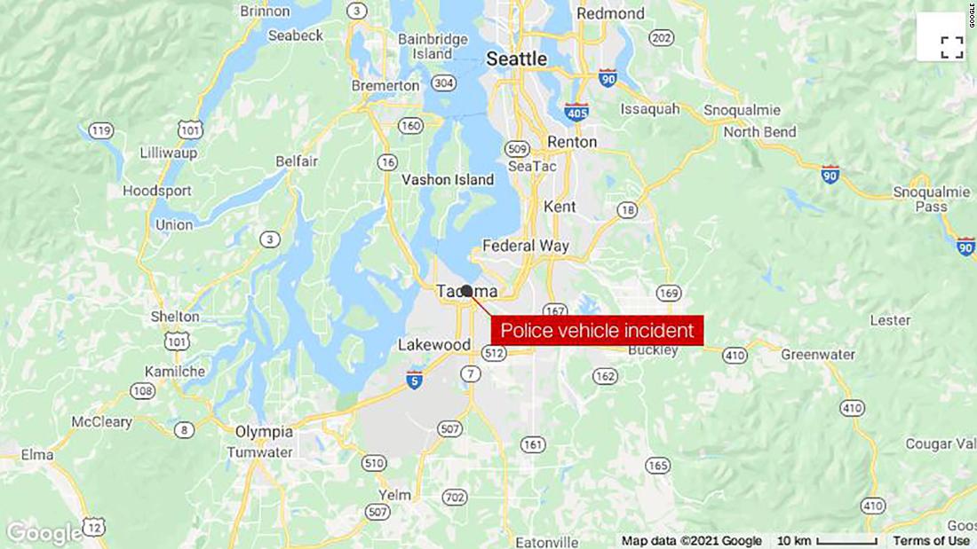 A police officer rides into the crowd in Tacoma, injuring at least one person, authorities say