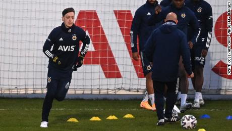 Mesut Ozil trains with Turkish side Fenerbahce following his transfer from Arsenal.
