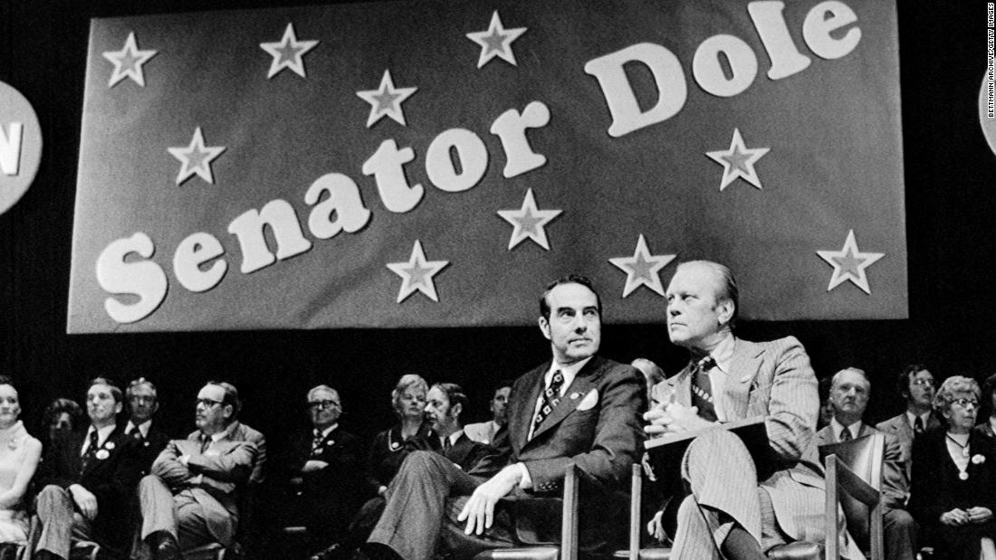 Dole became a US senator in 1969 and held the office until 1996. Here, Dole is joined by President Gerald Ford, who was in Wichita, Kansas, to give Dole a re-election boost in 1974. Dole would later become Ford&#39;s running mate in the 1976 presidential election.