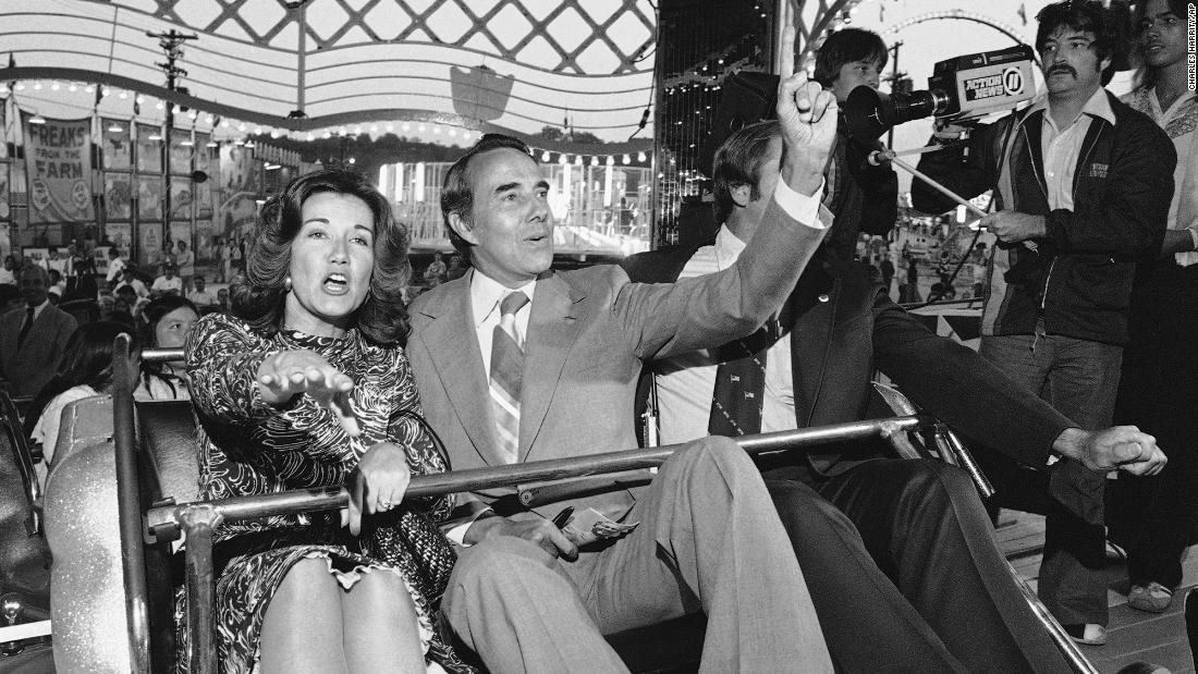 Dole and his wife, Elizabeth, enjoy a carnival ride at the Maryland State Fair in 1976.