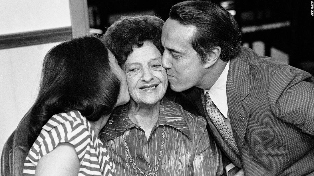 Dole and his daughter, Robin, kiss Dole&#39;s mother, Bina, on Mother&#39;s Day in 1979.