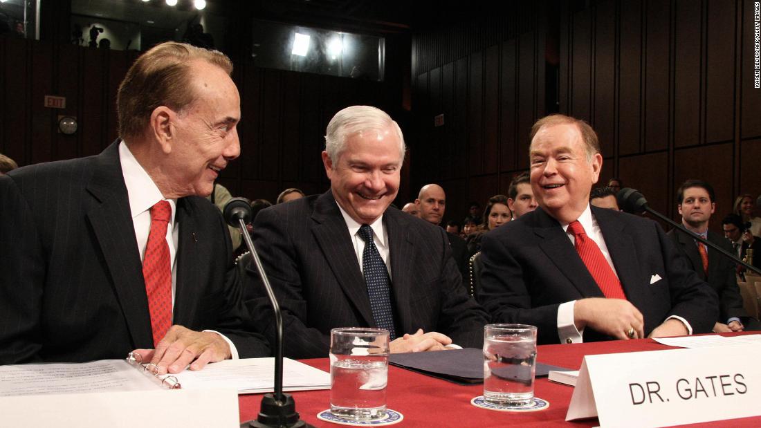 Dole sits with Robert Gates, center, and former US Sen. David Boren before Gates&#39; confirmation hearing in 2006. Gates had been nominated for defense secretary.